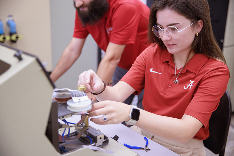 students working in a lab area